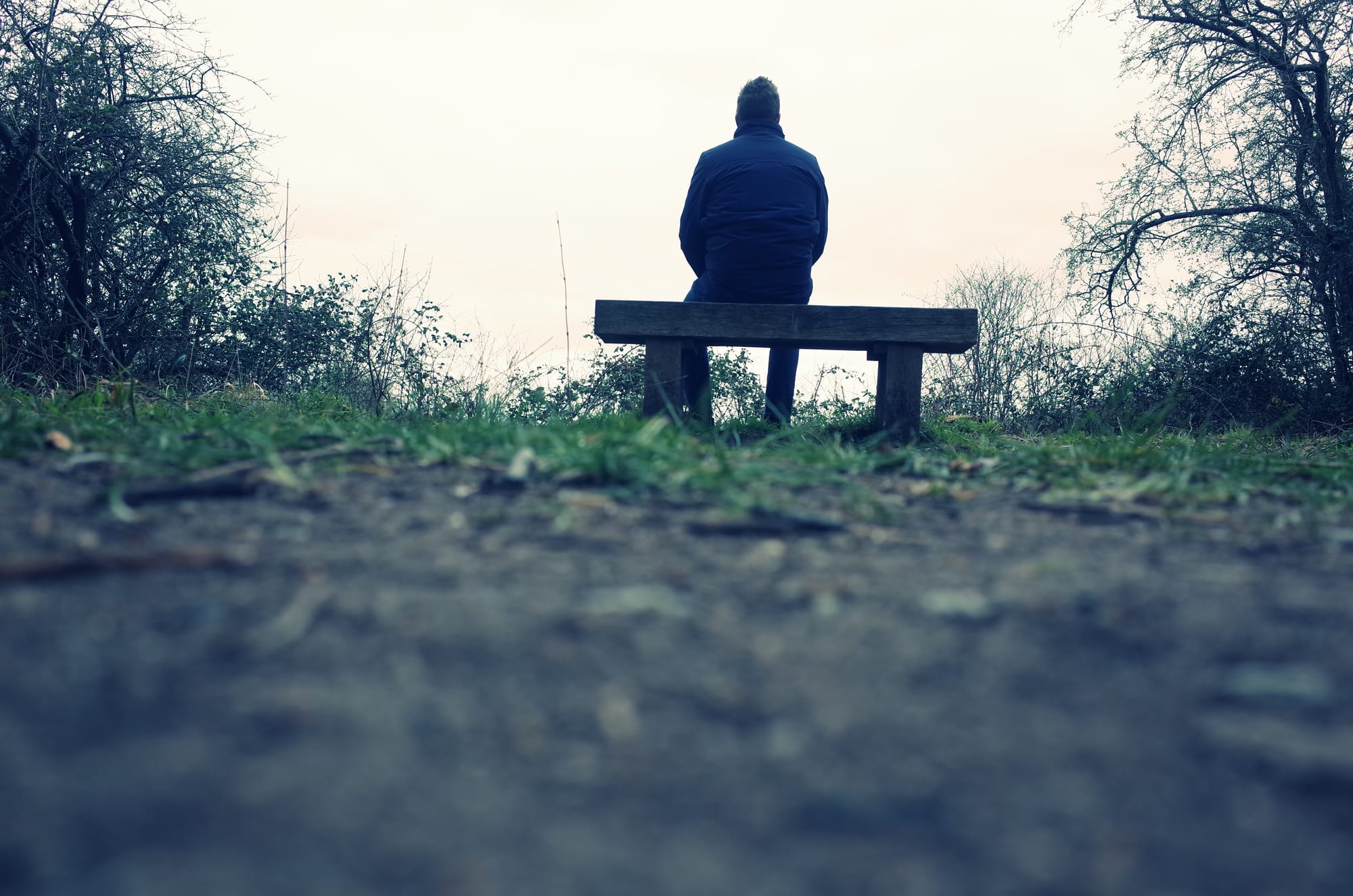 An image of Rob Lambert sat on a bench in Winchester