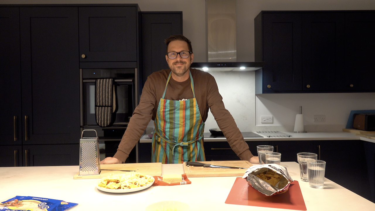 A photo of Rob Lambert wearing an apron 