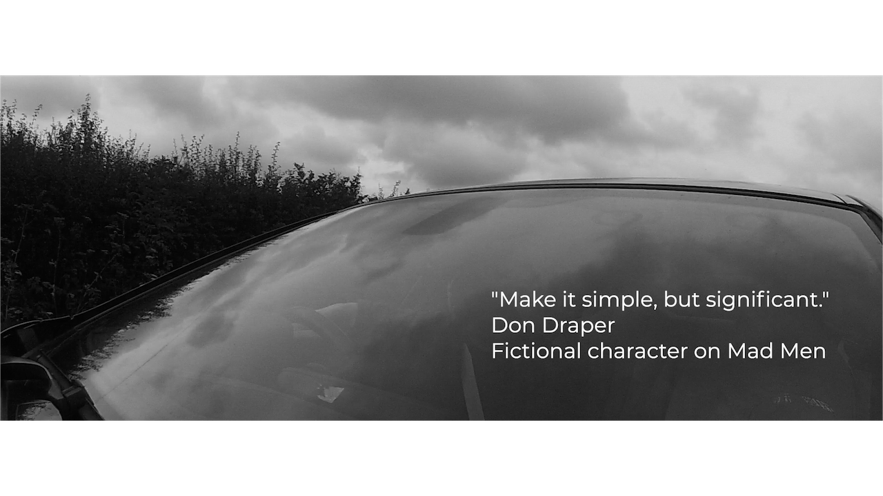 A photo of a car windscreen with the words Make it simple, but significant overlayed